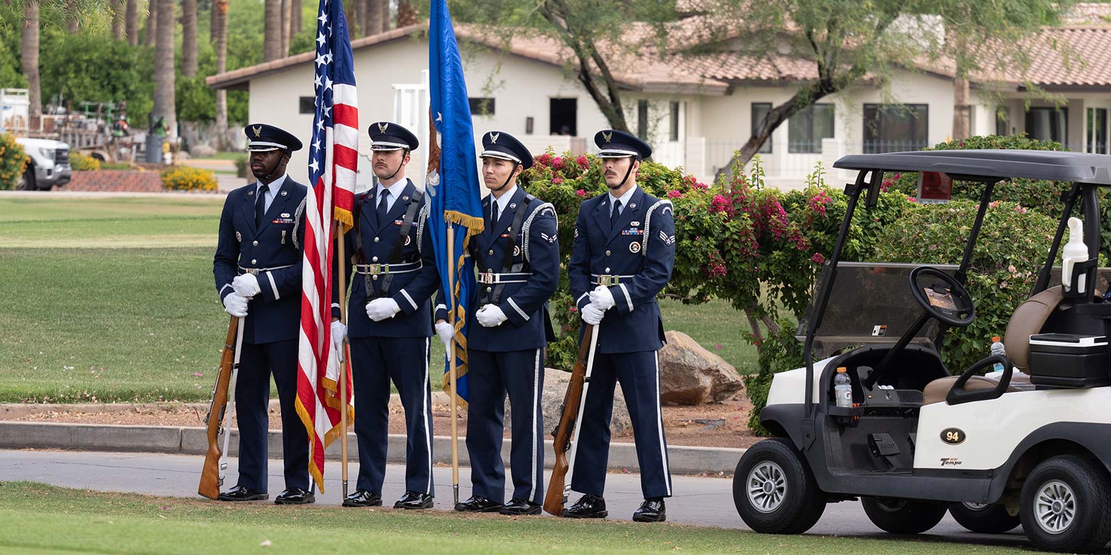 Honor Guard holding the colors at the 14th Annual Golf Classic.