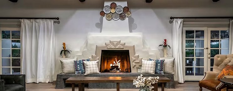 Wigwam's sunset presidential suite living room and fireplace.