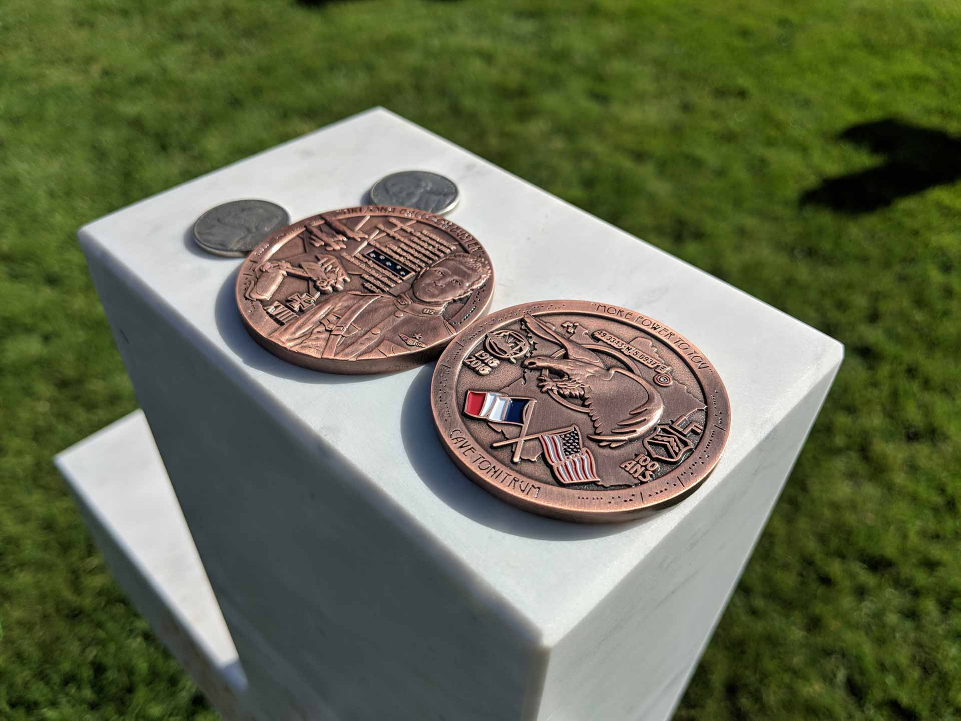 Coins on Frank Luke Jr RMO on his headstone Meuse-Argonne, France.